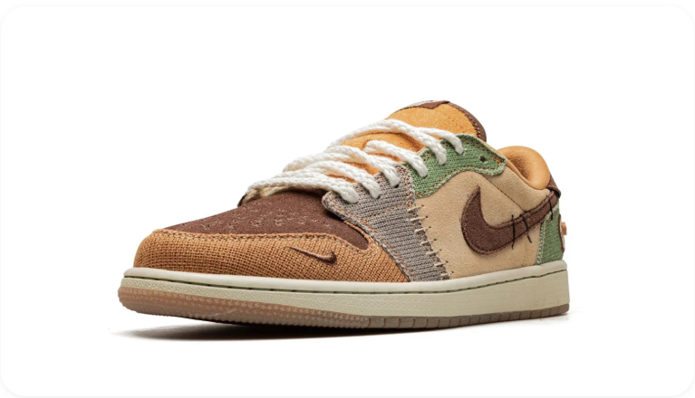 Air Jordan 1 Low OG Patchwork – front three-quarter angle showing brown Swoosh, hand-stitching, and patchwork panels